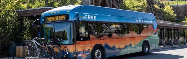 An electric bus loaded with bikes at the Old Town Transit Center in Park City, UT