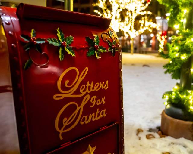 A Letters for Santa drop box surrounded by snow and holiday decor in Park City, UT