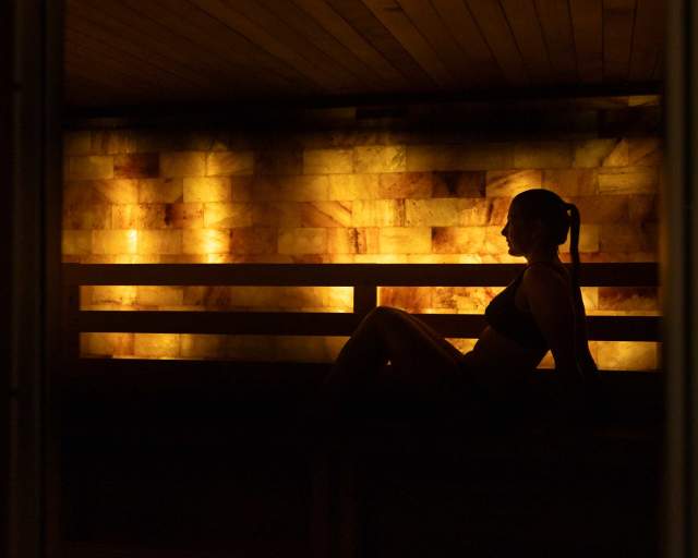 A woman sits in a wellness room in a spa in Park City, UT
