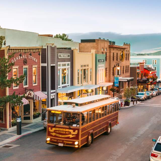 Historic Trolley driving up Historic Main Street in summer