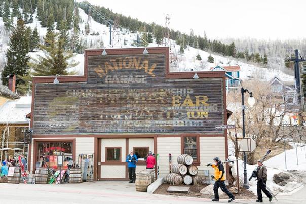 Exterior of High West Distillery with skiers walking by