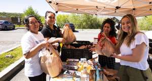 people helpnig a mobile food pantry