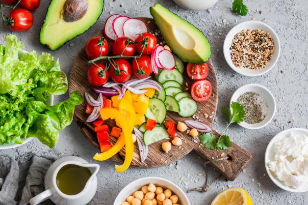 Overhead shot of a vegetable platter and dips on a grey table at a cooking class at Deer Valley in Park City, UT
