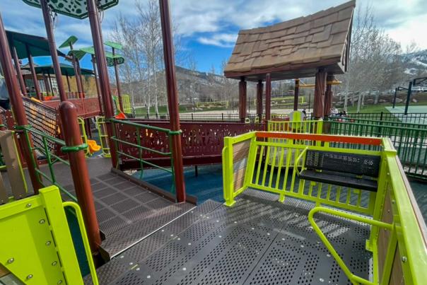 A colorful accessible ramp on the Willow Creek playground in Park City, UT