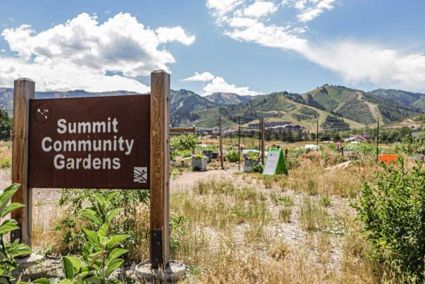 Wooden at the entrance of the Summit Community Gardens