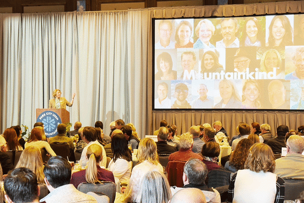 Chamber CEO Jennifer Wesselhof addresses a crowd at the 2025 Tourism Fall Forum at the Stein Eriksen Lodge in Park City, UT