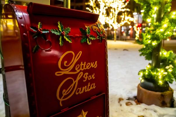 A Letters for Santa drop box surrounded by snow and holiday decor in Park City, UT