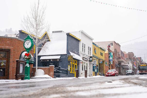 Historic Main Street Park City with holiday decor and snow
