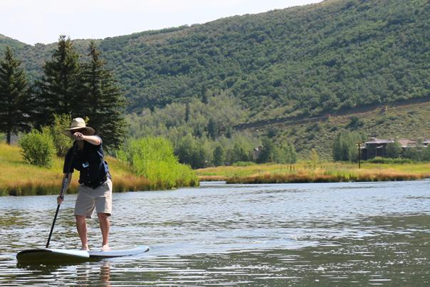 Man Stand Up Paddleboarding at Deer Valley Resort