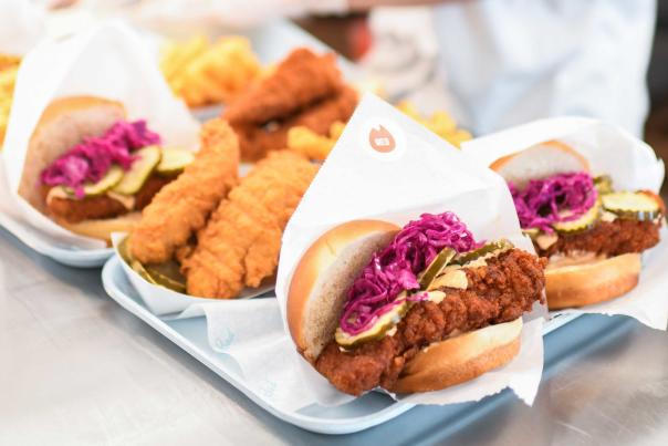 A row of chicken sandwiches sit on a counter in a restaurant in Park City, UT