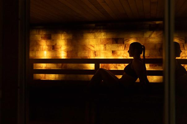 A woman sits in a wellness room in a spa in Park City, UT
