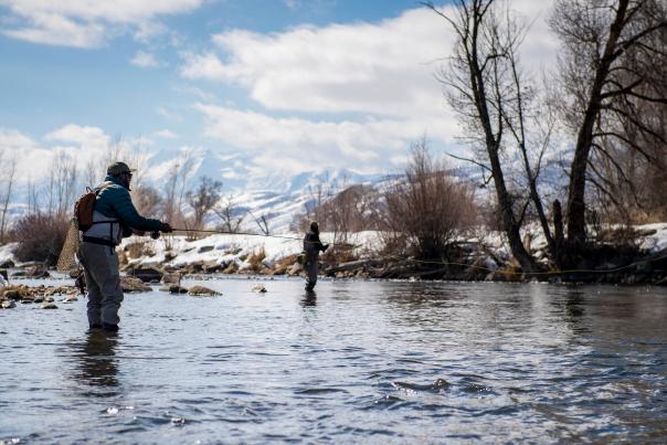 Two men casting fly fishing line in Provo River