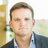 Derek Allman headshot