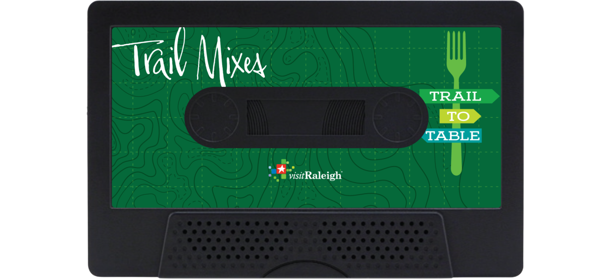 Promotional graphic designed as a cassette tape with a green topographic map background. Text reads 'Trail Mixes' alongside the Trail-to-Table logo, a fork-shaped trail sign displaying 'Trail-to-Table' and the Visit Raleigh logo at the bottom.