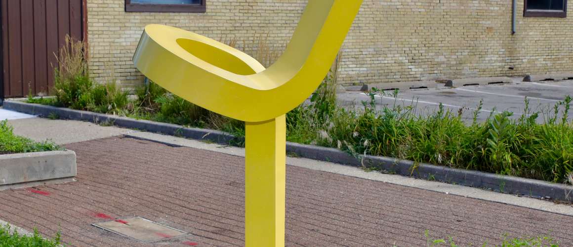 here comes the sun sculpture