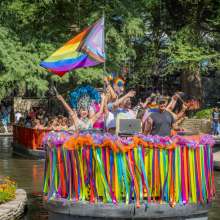 River barge filled with people celebrating