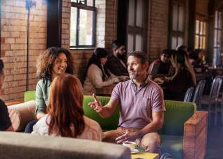 Meeting professionals meet over coffee