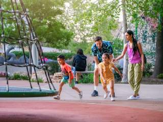 Family with small children at Yanaguana Garden at Hemisfair.