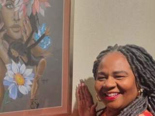 Museum curator in front of artwork