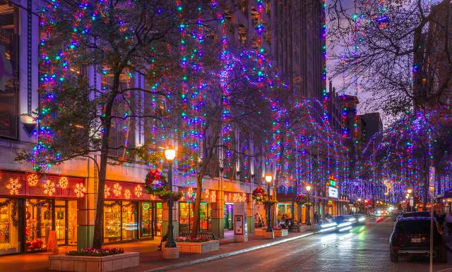 Houston Street in San Antonio adorned with holiday lights and wreaths.