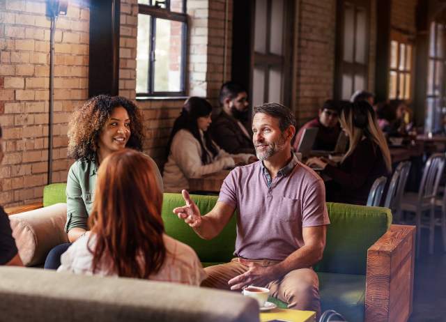 Meeting professionals meet over coffee