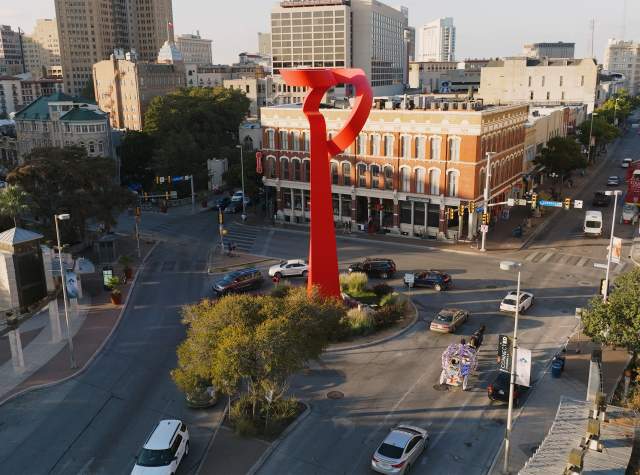 Overhead view of downtown San Antonio with Torch of Friendship sculpture.