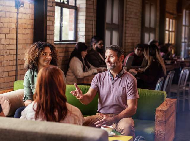 Meeting professionals meet over coffee