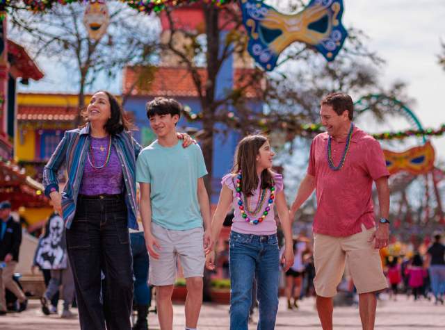 Family with teens at Six Flags Fiesta Texas.