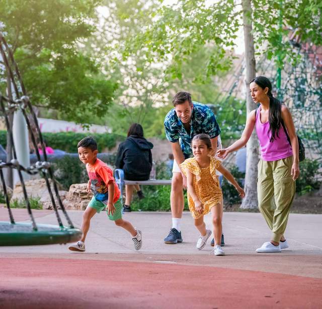 Family with small children at Yanaguana Garden at Hemisfair.