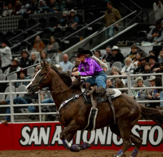 Woman riding horse at San Antonio Stock Show & Rodeo