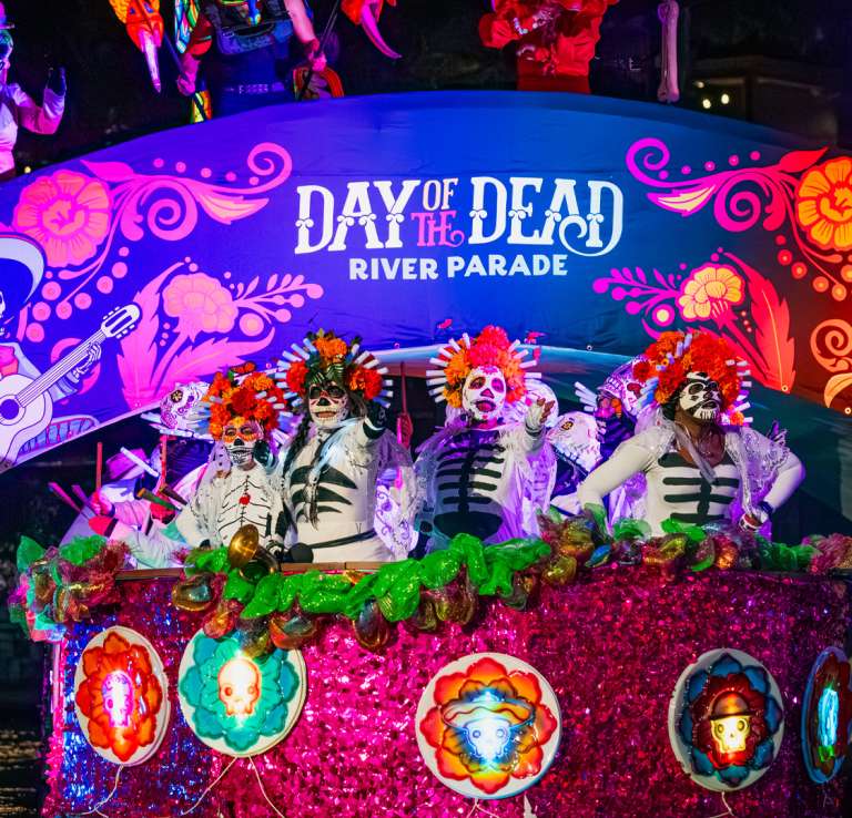 River barge decorated for Day of the Dead River Parade at San Antonio River Walk.
