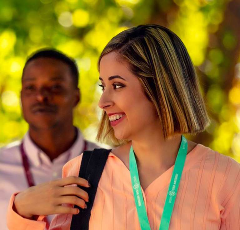 Group of professionals walking through park