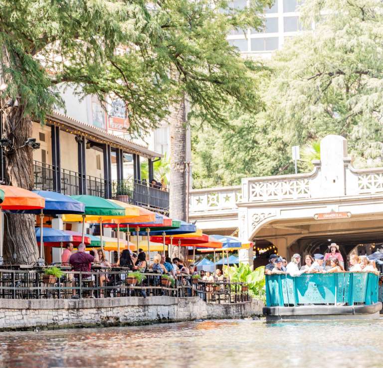 River barge floating by Casa Rio in San Antonio.
