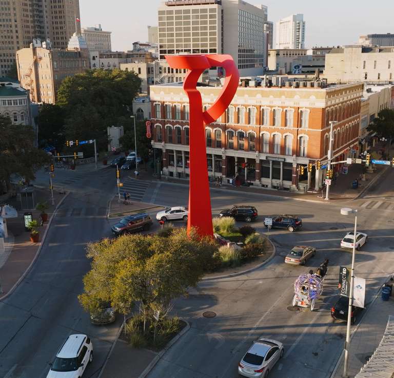 Overhead view of downtown San Antonio with Torch of Friendship sculpture.