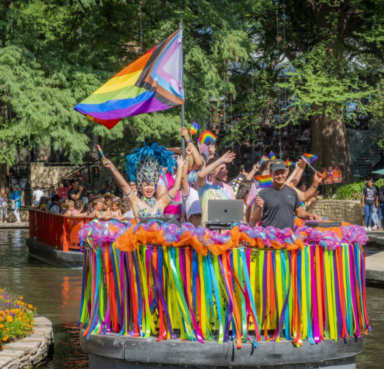 River barge filled with people celebrating