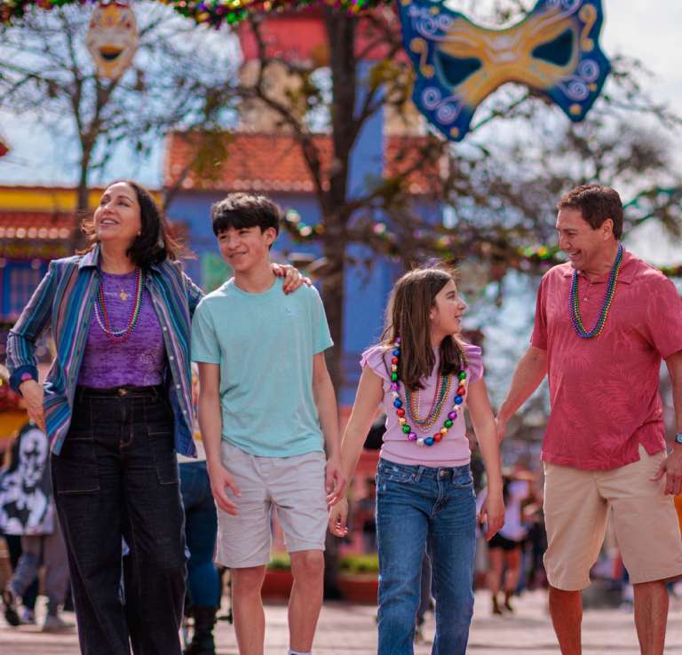 Family with teens at Six Flags Fiesta Texas.