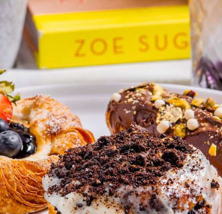 Donuts with chocolate spread and cookie crumbles