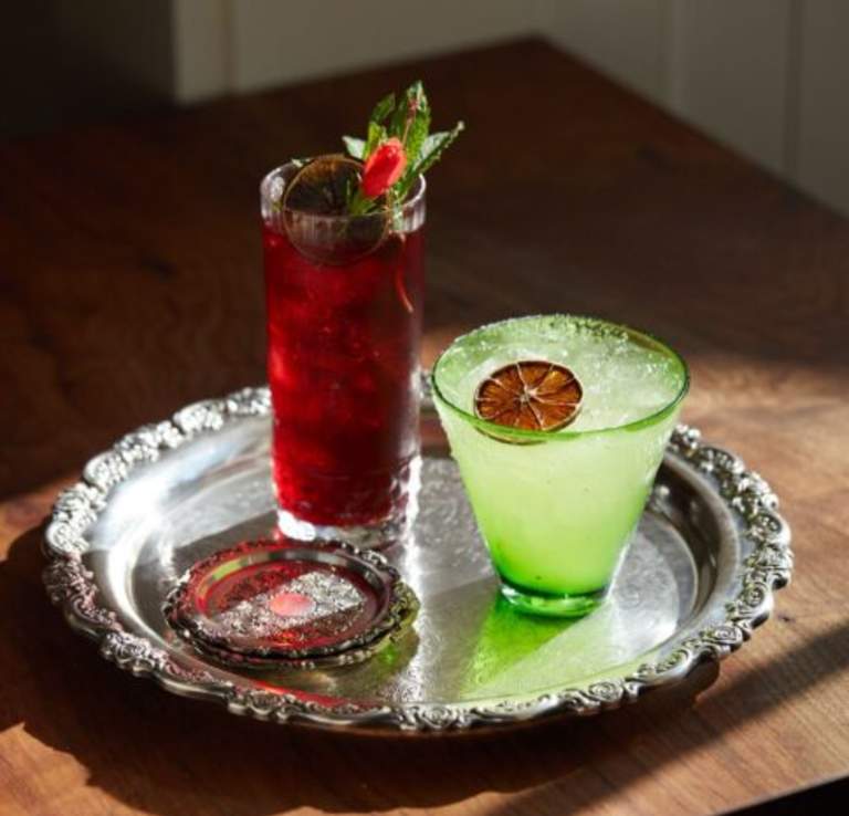 Two cocktails on a silver platter