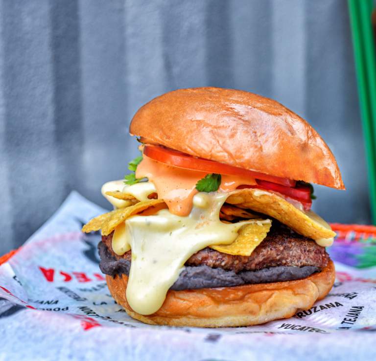 Loaded hamburger with melted cheese