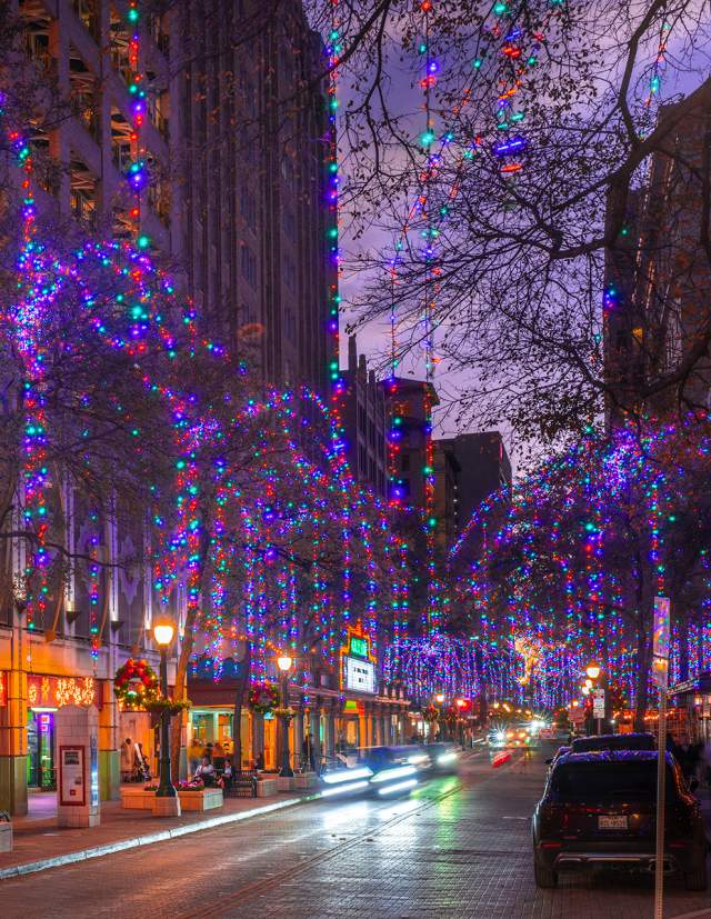 Houston Street in San Antonio adorned with holiday lights and wreaths.