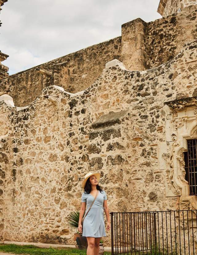 Woman walking through Mission San Jose in San Antonio Missions National Historical Park