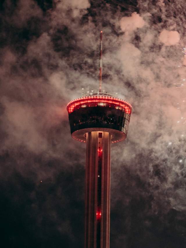 Fireworks in front of the Tower of the Americas at New Year's Eve party in San Antonio.