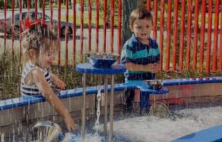 Kids playing with fountain