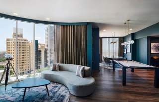 Spacious hotel room with large windows
