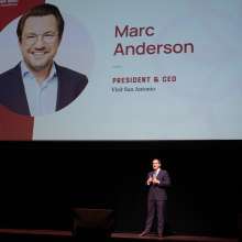 Man onstage talking