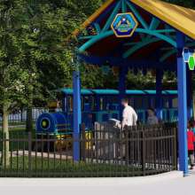 Rendering of people in front of children's train ride.
