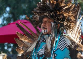 United San Pow Wow Performer in traditional attire