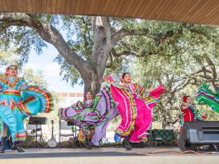 Folklorico dancers dancing at Plaza de Valero pavilion.