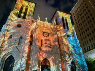 Light show projected onto San Fernando Cathedral