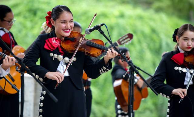 Mariachi band member playing violin